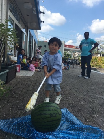 Breaking watermelon game at High Five Kids