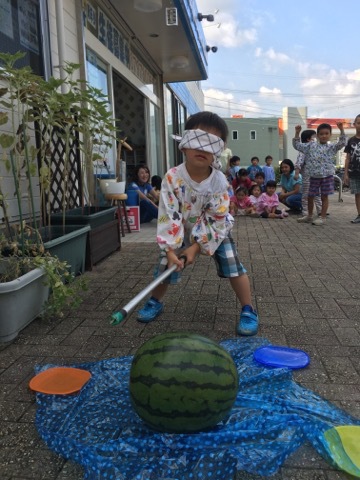 Breaking watermelon game at High Five Kids
